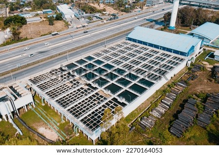 Aerial View of Drinking water treatment plant. Microbiology of drinking water production and distribution,Wastewater Treatment Facilities. Microbiology of drinking water production. Expressway road