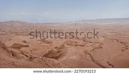 Wide panorama of Dead sea and Judean Desert view from the hill with Remains  of an ancient fortress Hyrcania, Khirbet el-Mird or Horcania. Royalty-Free Stock Photo #2270193213