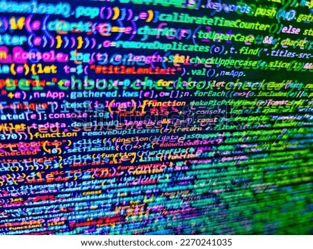 Matrix byte of binary data rian code running abstract background in dark blue digital style. Developer working on program codes in office. Abstract computer script source code. Source code photo