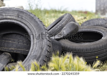  used car tires pile in the tire repair shop yard