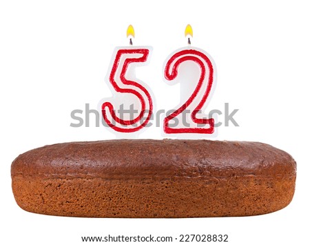 birthday cake with candles number 52 isolated on white background