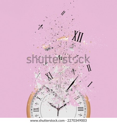 Fleeting time concept. Analog clock dissolving on pink background Royalty-Free Stock Photo #2270349003