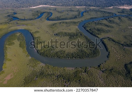 Aerial view of meandering river in jungle of Gambia Royalty-Free Stock Photo #2270357847