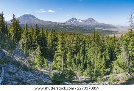 View of the Three Sisters from Rim Lake in the Three Sisters Wilderness, Oregon. Royalty-Free Stock Photo #2270370859