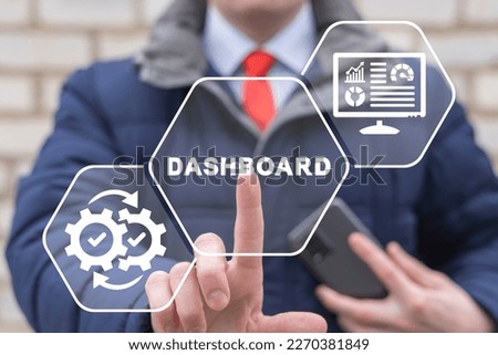 Admin using virtual touchscreen presses word: DASHBOARD. Concept of dashboard. Control panel user interface, UX, KIT, design, UI infographic, data graphic and chart. Administrator analyzes big data.
