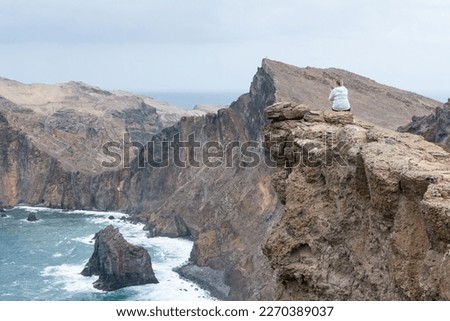 madeira sea rock view summer travel tourism vacation clif geology nature mountain peak woman take picture selfie