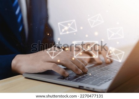 Businessman sending a letter from a computer. electronic mail concept is online communication on the Internet network Receiving and sending information or messages in digital technology