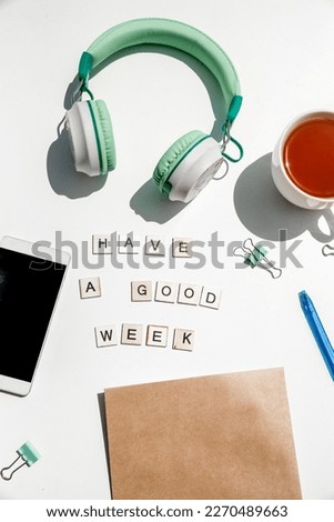 'have a good week' wording and metal paper clips isolated over white background, business concept, memory reminder paper, work or educational tools. High quality photo