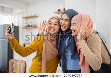 Fashion concept of young Asian muslim woman friends wearing Hijab. Beauty photo. Cosmetics. Skin care. Body care.