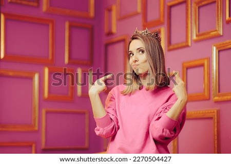 
Vain Queen Wearing a Crown Pointing to Herself. Attention seeker diva behaving princess girl feeling self-important and overconfident
 Royalty-Free Stock Photo #2270504427