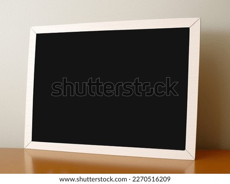 Picture frame for painting or photography to design with a black background and a white border like a blackboard