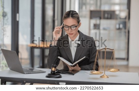Asian business woman lawyer Working on paperwork at the office