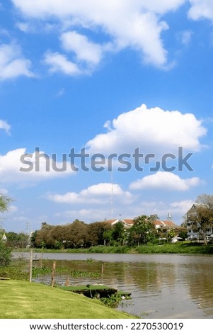 Scenic view of the Ping river and houses along the river bank