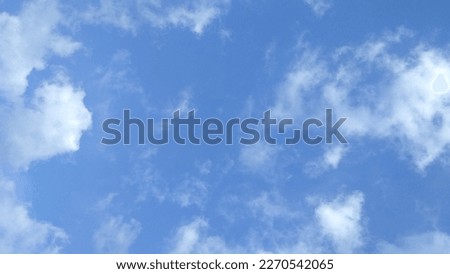 Looking straight up at the the sky. Thin clouds pattern with blue sky as background  Royalty-Free Stock Photo #2270542065