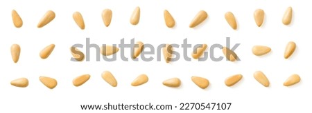 Roasted pine nuts isolated on the white background, top view. Royalty-Free Stock Photo #2270547107
