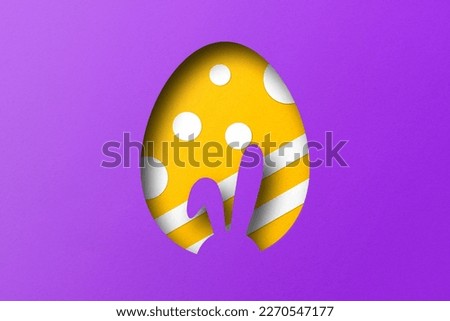 Purple and yellow paper cuts form an Easter egg pattern. overlay paper