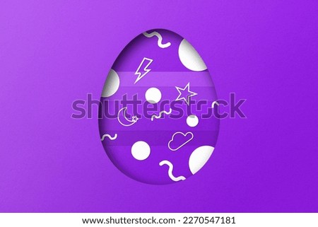 Purple paper cut to form an Easter egg pattern.