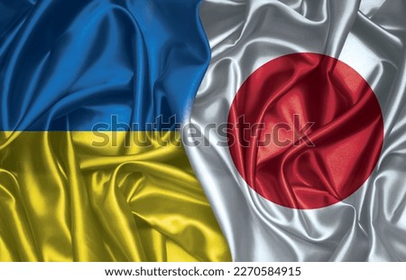 Ukraine and Japan two folded silk flags together