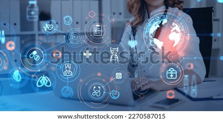 Doctor woman working with laptop, digital healthcare interface with diverse medical icons hologram. Concept of health insurance and online consultation