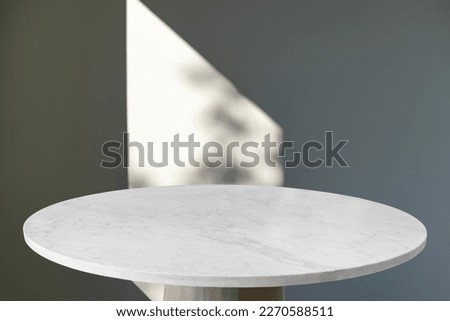 Marble table with window shadow drop on white wall background for mockup product display Royalty-Free Stock Photo #2270588511