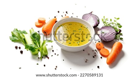 Chicken broth, stock or bouillon with vegetables isolated on white background
