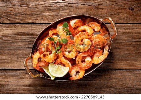 Grilled fresh Spicy  Prawns Shrimps with lime and oregano in serving pan. top view Royalty-Free Stock Photo #2270589145