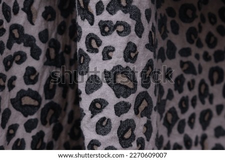 a cloth that has a leopard print