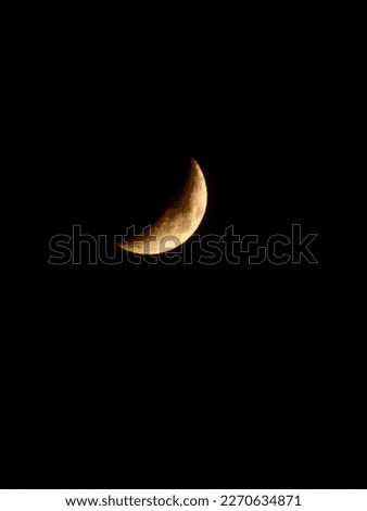 A beautiful half moon in red colour
