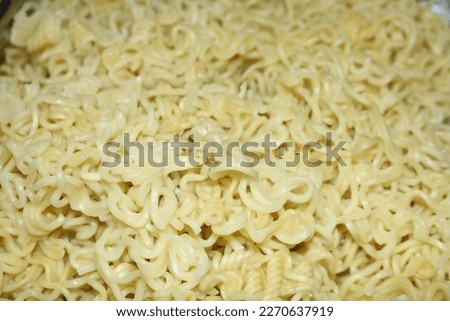 Instant yellow noodles texture. Close up.