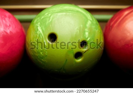 Bowling balls in stand. Colored bowling balls at bowling alley,relaxing and sport concept.