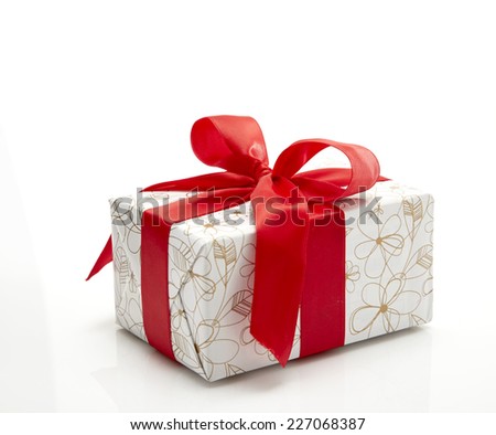 red Gift box with ribbon and bow isolated on the white background