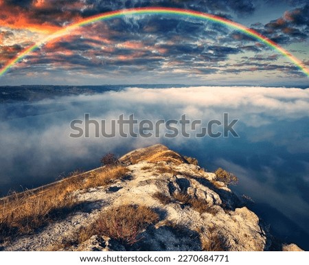 colorful rainbow over river canyon. autumn landscape. nature of Ukraine 