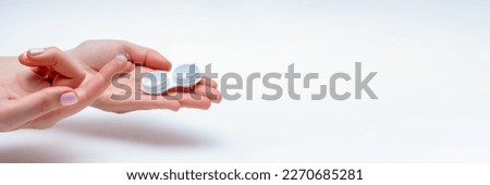 Contact Eye Lenses. Woman Hands Holding Contact Eye Lens. Woman Hands Holding White Eye lens Container. Beautiful Woman Fingers Holding Eye Lens Box. Health And Eyes Care Concept. High Resolution.  Royalty-Free Stock Photo #2270685281