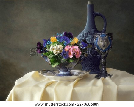 Still life with spring flowers and wine
