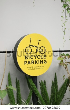 Malang - East Java, Indonesia - 2023. Signs for bicycle parking in the city park area.