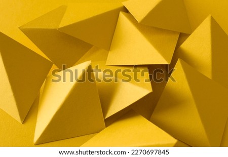 Geometric yellow 3d background with triangle shapes