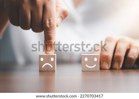 Rating feedback scale on wood cube with copy space. Service rating, dissatisfied with satisfaction concept, Bad review, bad service dislike bad quality, low rating, negative social media not good. Royalty-Free Stock Photo #2270703417