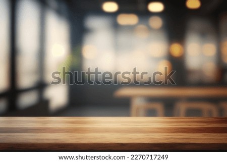 Wooden empty table in front, blurred cafe background. Bar counter key visual. Wood table top for presentation product. Restaurant table mockup. Cafe desk effect. Office space