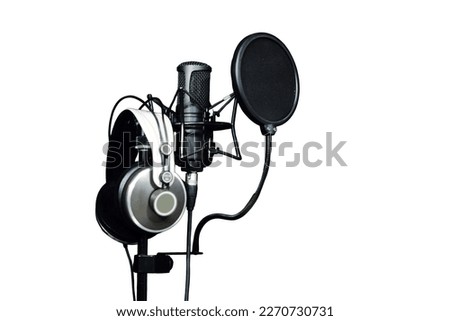 Microphone close - up on the background of a professional recording Studio, isolated on a white background. Workplace singers and musicians Royalty-Free Stock Photo #2270730731