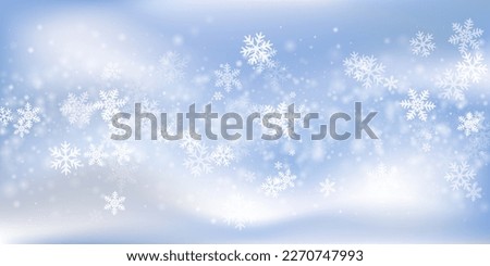 Fantasy flying snow flakes wallpaper. Wintertime dust frozen granules. Snowfall weather white blue composition. Blurred snowflakes december theme. Snow hurricane landscape.