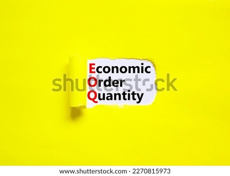 EOQ economic order quantity symbol. Concept words EOQ economic order quantity on white paper on a beautiful yellow background. Business and EOQ economic order quantity concept. Copy space.