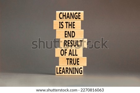 Change symbol. Concept words Change is the end result of all true learning on wooden blocks. Beautiful grey table grey background. Copy space. Motivational business change result concept.