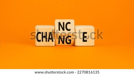 Chance and change symbol. Concept word Chance Change on wooden cubes. Beautiful orange table orange background. Business and chance and change concept. Copy space. Royalty-Free Stock Photo #2270816135