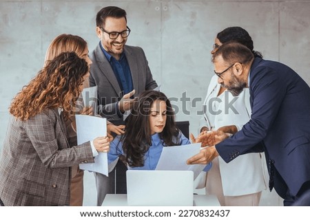 Shot of a young businesswoman looking anxious in a demanding office environment. Frustrated millennial female worker felling tired of working quarreling. Workplace Conflicts.  Royalty-Free Stock Photo #2270832437