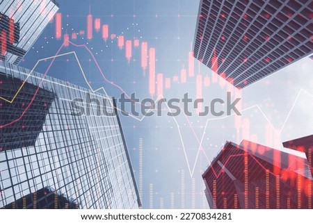 Investing, trading and real estate market crisis concept with digital red financial chart candlestick and graphs on modern skyscraper tops bottom view background, double exposure Royalty-Free Stock Photo #2270834281