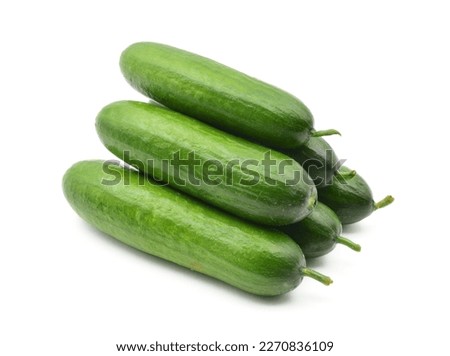 A stack of cucumbers isolated on white background