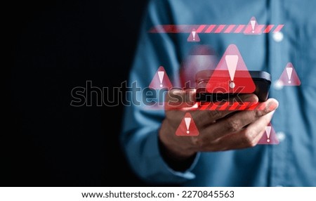 System warning caution sign on smartphone, scam virus attack on firewall for notification error and maintenance. Network security vulnerability, data breach, illegal connection and information danger. Royalty-Free Stock Photo #2270845563
