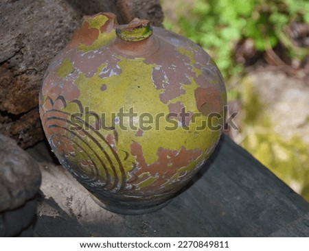 Vintage retro clay pot used for storing water and wine