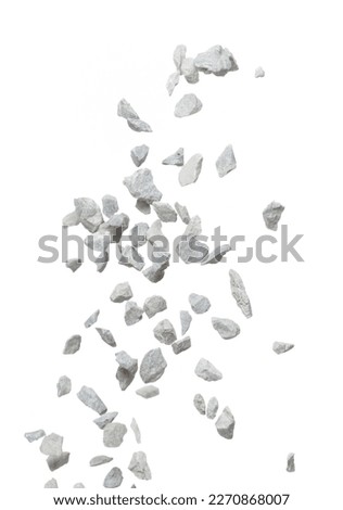 Rock gravel fall down pouring, gray stone pebbles rock explode abstract cloud fly. Construction rock stone splash in air, object design. White background isolated freeze shot, selective focus blur Royalty-Free Stock Photo #2270868007