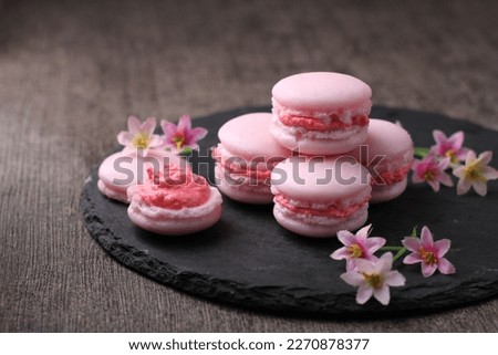 A macaron or French macaroon is a sweet meringue-based confection made with egg white, icing sugar, granulated sugar, almond meal, and food colouring.